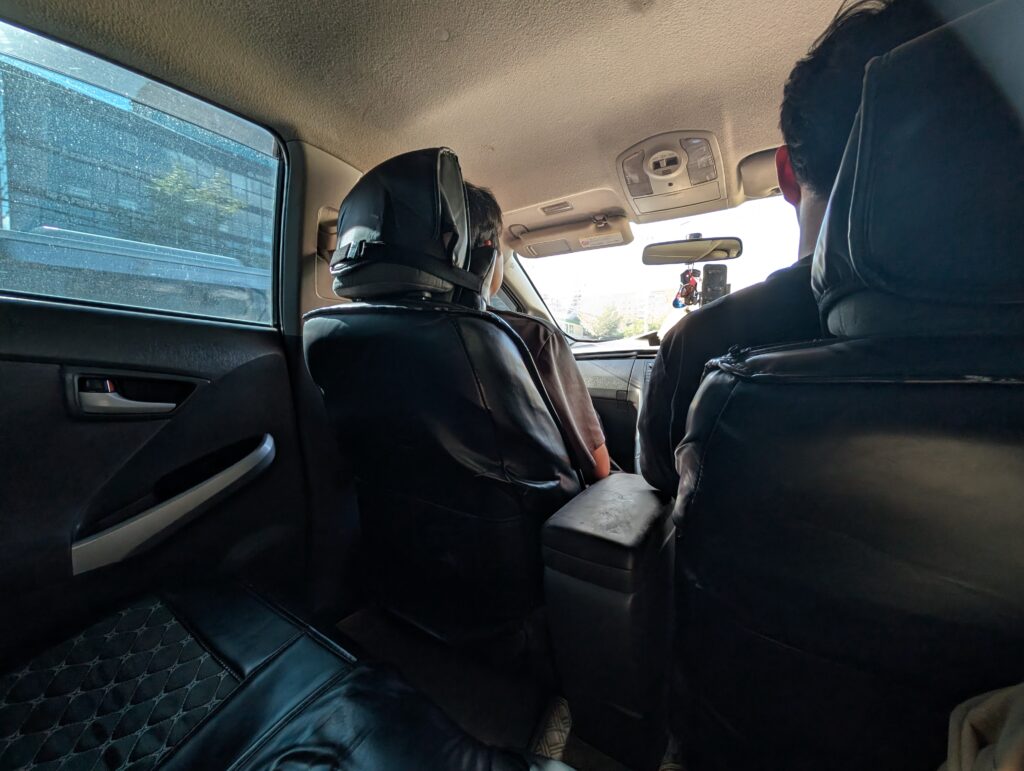 UBCabで乗った車の車内。助手席に知らない同乗者がいた